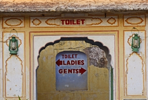 A brightly painted public toilet