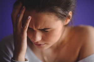 Young woman with a headache